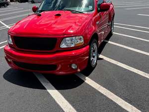 2001 Ford F-150 SVT Lightning with Red Exterior