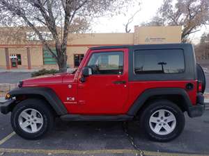 Red 2009 Jeep Wrangler Sport (Red)