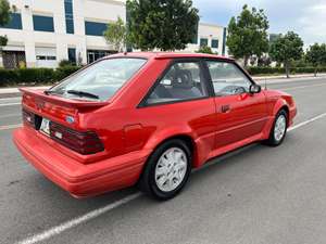Red 1986 Ford Escort