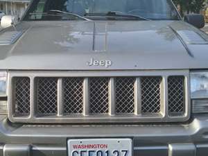 1998 Jeep Grand Cherokee L with Gold Exterior