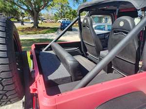 Pink 1991 Jeep Wrangler