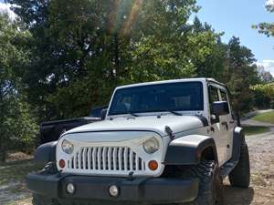 2013 Jeep Wrangler Unlimited with White Exterior