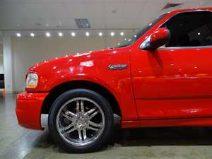 2002 Ford F-150 SVT Lightning with Red Exterior