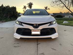 White 2019 Toyota Camry Hybrid LE