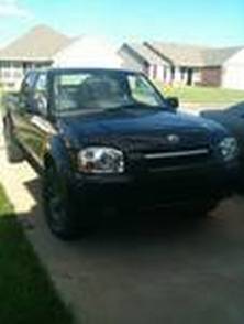 2004 nissan frontier blue book value