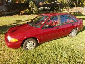 Red 1991 Ford Escort
