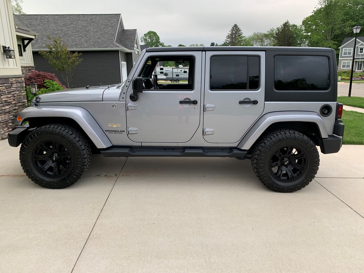 2014 Jeep Wrangler for sale by owner in Grand Rapids