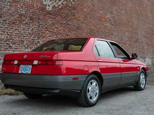 Red 1991 Alfa Romeo 164 L