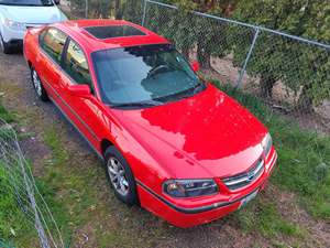 Red 2000 Chevrolet Impala