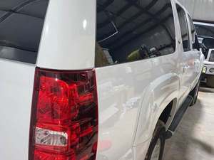 2010 Chevrolet Suburban with White Exterior