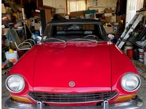 Red 1974 Fiat 124 Spider