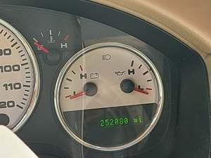 Brown 2006 Ford E-150