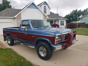 Blue 1985 Ford E-250