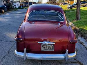 Red 1949 Ford ford custom sedan