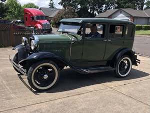 Green 1930 Ford Model A  4- door