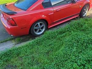 Red 2004 Ford Mustang Mach 1