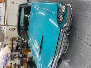 Teal 1964 Ford Thunderbird