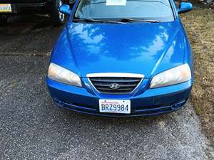 2006 Hyundai Elantra Coupe with Blue Exterior