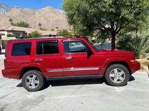 Red 2010 Jeep Commander 