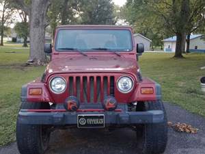 Red 1999 Jeep Wrangler