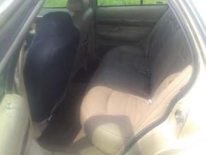 Gold 1999 Mercury Grand Marquis