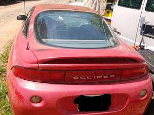 1997 Mitsubishi Eclipse with Red Exterior