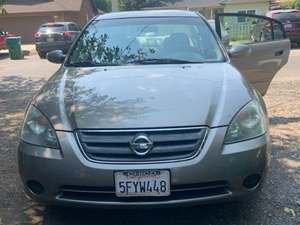 2004 Nissan Altima with Gold Exterior