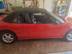 Red 1995 Oldsmobile Cutlass Supreme