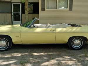 Yellow 1975 Oldsmobile Delta Eighty-Eight Convertible 