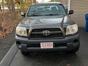 Gray 2011 Toyota Tacoma with Plow
