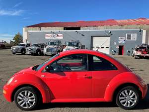 Red 2000 Volkswagen New Beetle