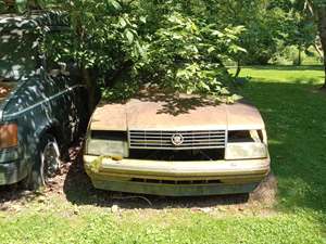 Gold 1987 Cadillac Allante