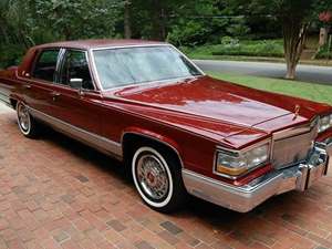 Red 1992 Cadillac Brougham