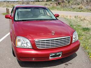 Red 2004 Cadillac DeVille