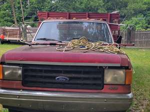 Red 1987 Ford 3500