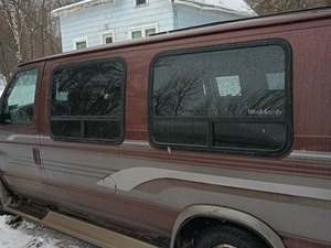 Red 1995 Ford E-150