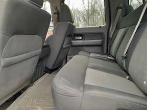 Gray 2007 Ford E-150