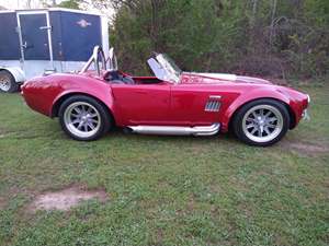 Red 1965 Ford Shelby SVT Cobra