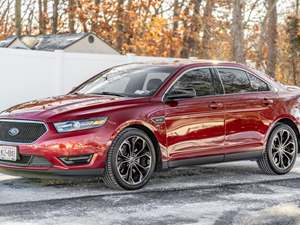 Red 2013 Ford Taurus