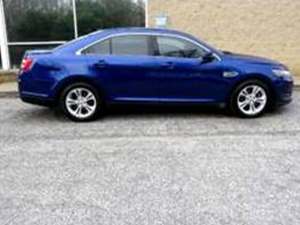 Black 2014 Ford Taurus sel 