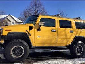 Yellow 2005 Hummer H2