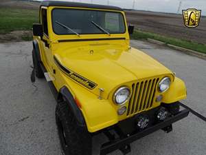 Yellow 1985 Jeep CJ-7