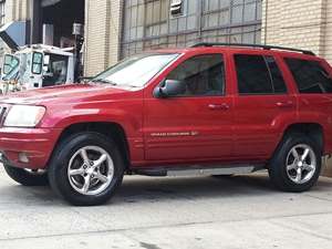 Red 2002 Jeep Grand Cherokee Overland Edition