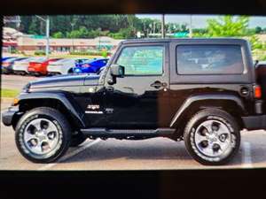 Black 2015 Jeep Sahara 