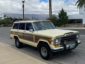 Yellow 1988 Jeep Wagoneer