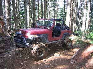 Red 1987 Jeep Wrangler