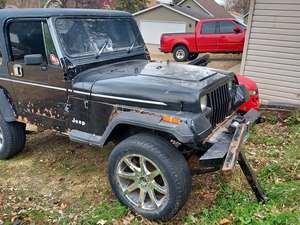 Blue 1989 Jeep Wrangler