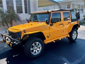 Yellow 2012 Jeep Wrangler Unlimited