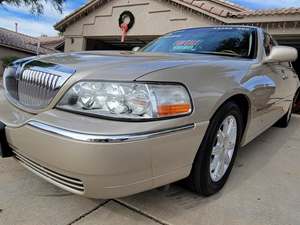 2010 Lincoln Town Car with Gold Exterior