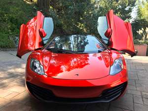 Red 2014 Mclaren MP4-12C